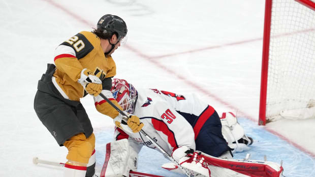 Apr 20, 2022; Las Vegas, Nevada, USA; Washington Capitals goaltender Ilya Samsonov (30) makes a save against Vegas Golden Knights center Chandler Stephenson (20) during the third period at T-Mobile Arena. Mandatory Credit: Stephen R. Sylvanie-USA TODAY Sports